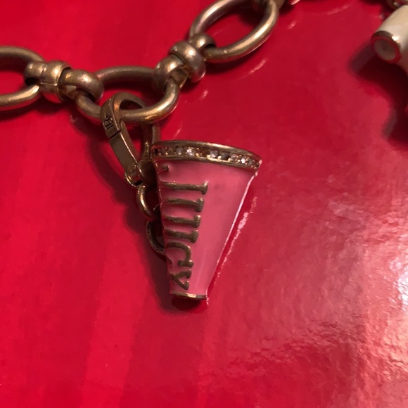 JUICY COUTURE 3 CHARM BRACELET. ONE NOT REMOVABLE